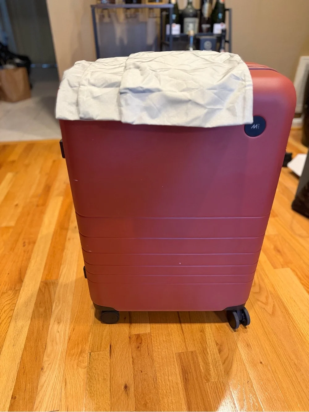 Monos medium check in 24” terracotta color suitcase LIKE NEW